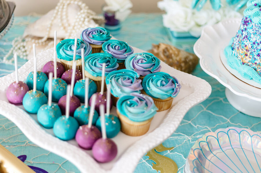 Aqua and purple cake pops and cupcakes